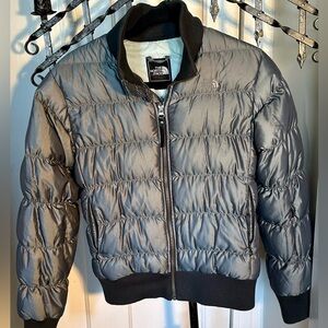 The North Face, waist length, down filled jacket.